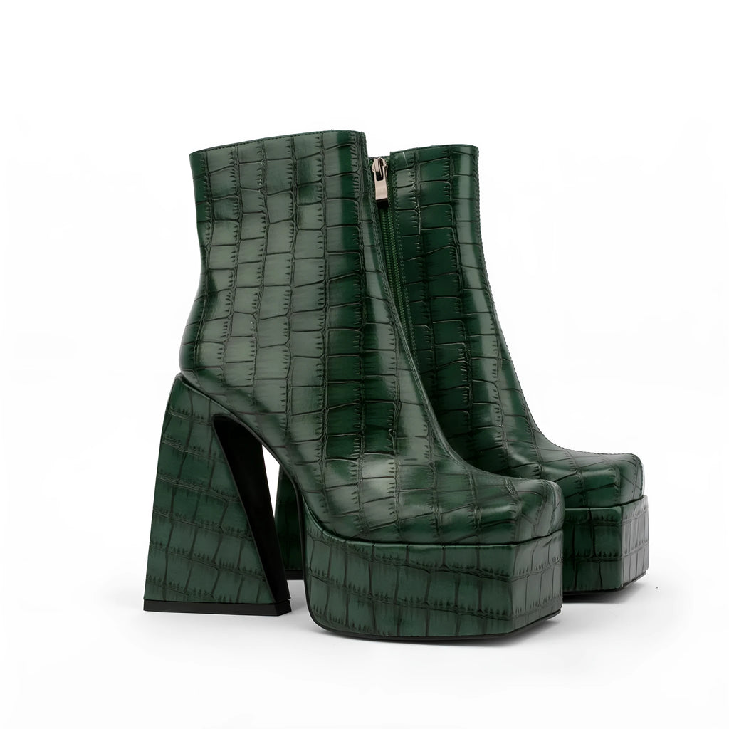 Women's ankle boot with a super high heel in a solid beige colour, made from artificial PU material.