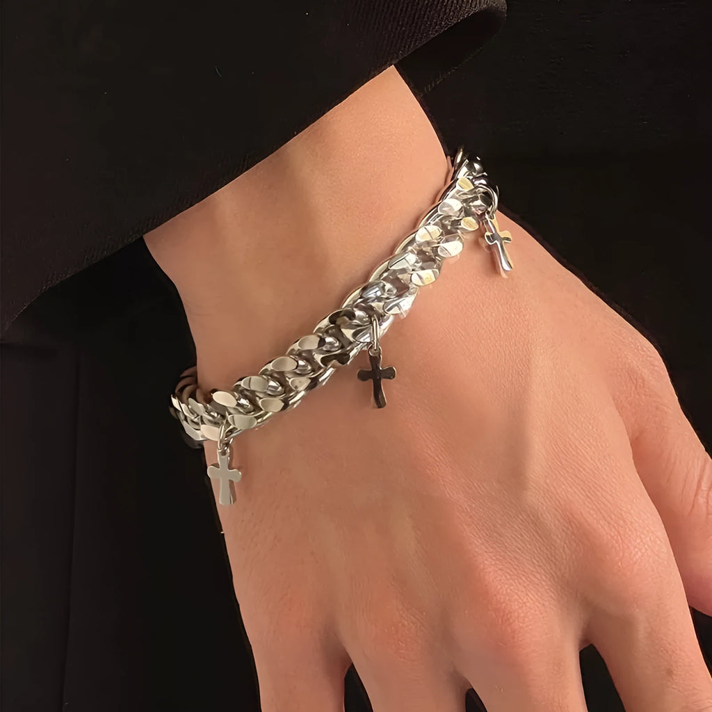 Men's titanium steel bracelet showing geometric cross design on a wrist.