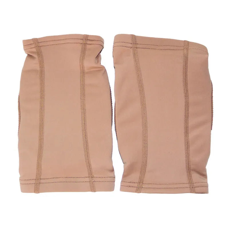 A pair of black ballet and dance knee pads for yoga exercise, shown alongside a skin colour pair.