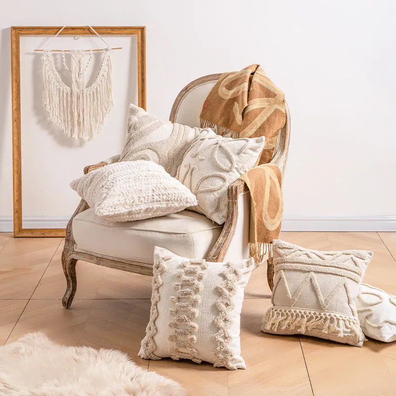 Knitted cushion cover with tassel trim in stripe pattern, available in six colours including spiral dots and woven rabbit fur