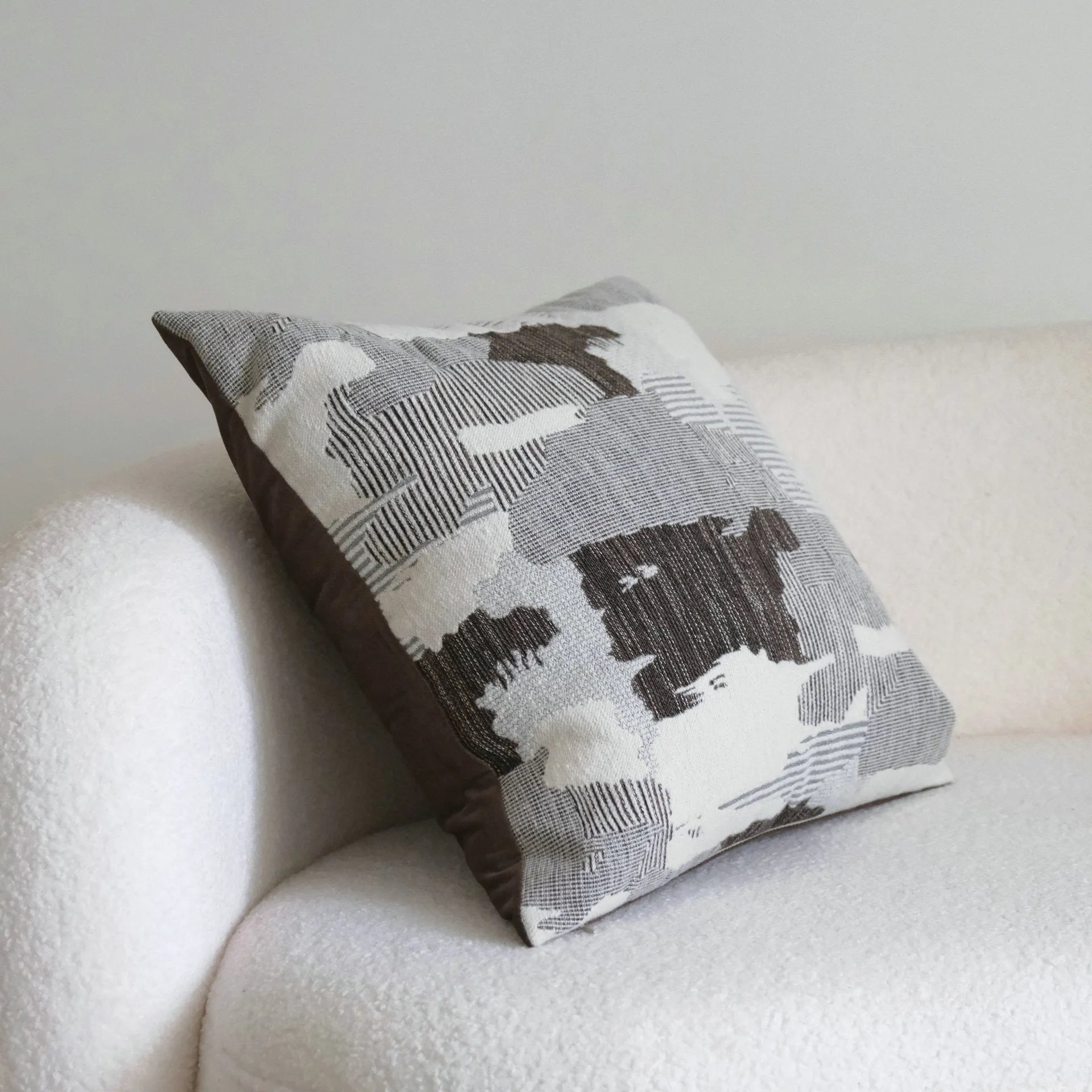 Coffee brown Chinese classical style cushion cover with stripe pattern on a living room sofa
