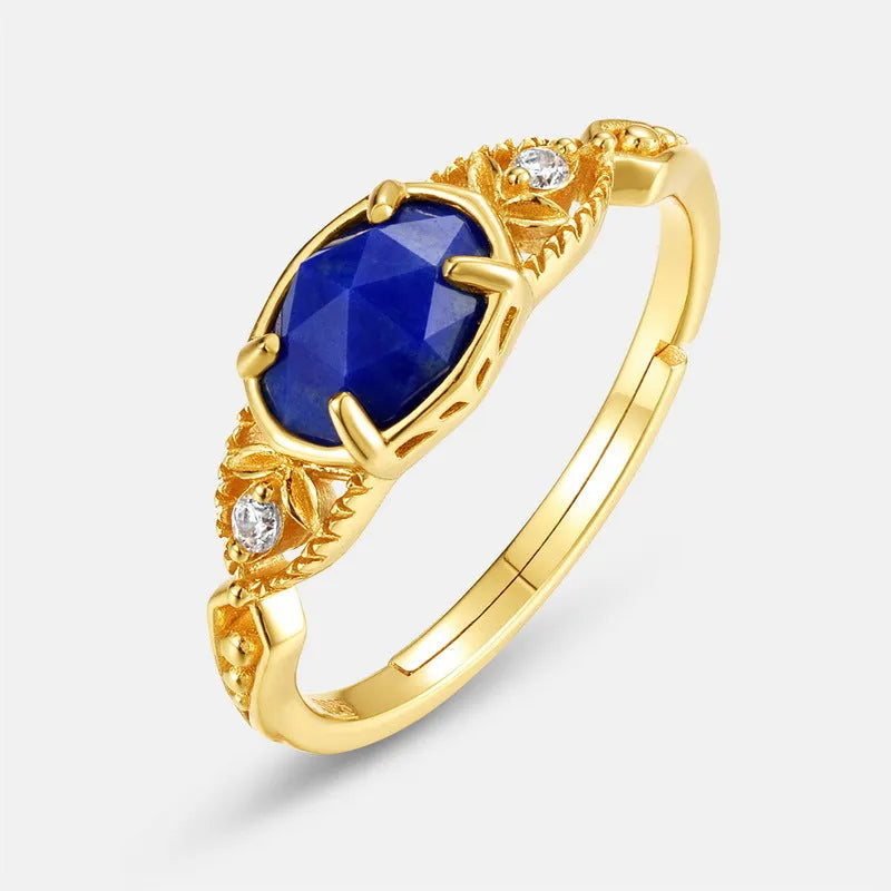 Silver alloy geometric oval ring with lapis lazuli blue stone and round decorative elements