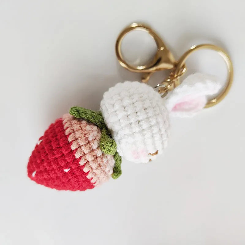 Hand-woven white rabbit strawberry pendant made from doll wire with attachment key