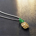 Silver pineapple charm necklace with geometric diamond pattern on adjustable chain