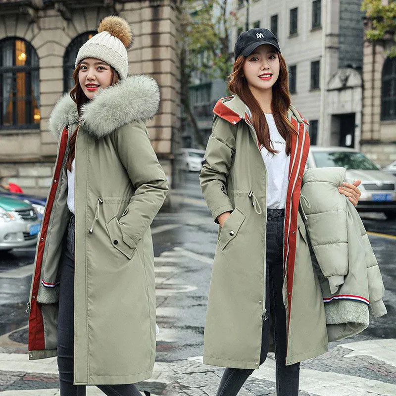 Women's long beige trench coat with fleece lining and button front.