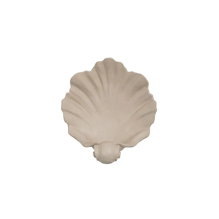 White resin shell-shaped fruit plate ornament with light luxury styling on a table.