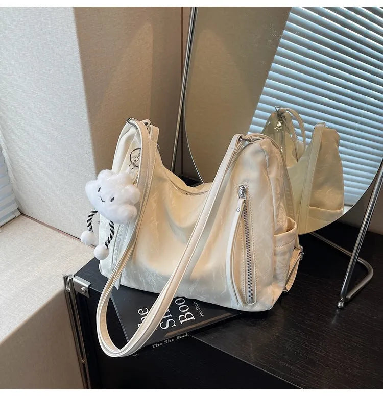 Women's soft PU fashion backpack with pendant accessory in multiple colour options
