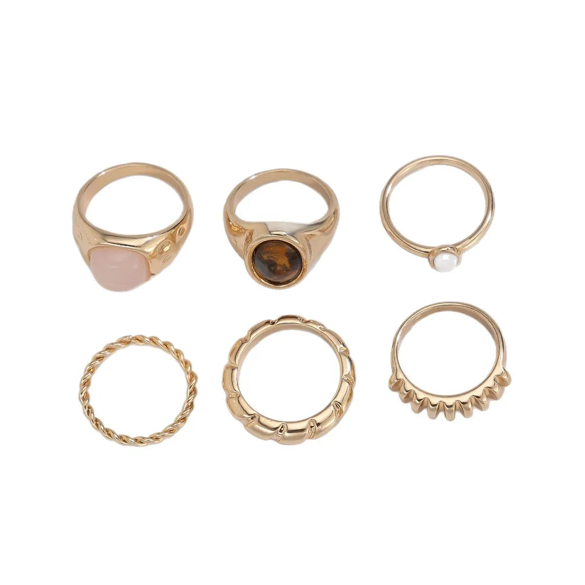 Six light gold geometric and round alloy rings for women displayed together