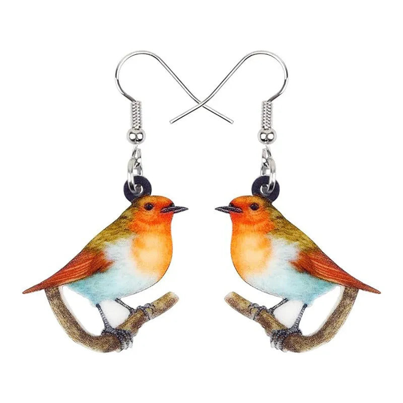 Acrylic blue titmouse pendant earrings with geometric animal zodiac design and printed snake pattern