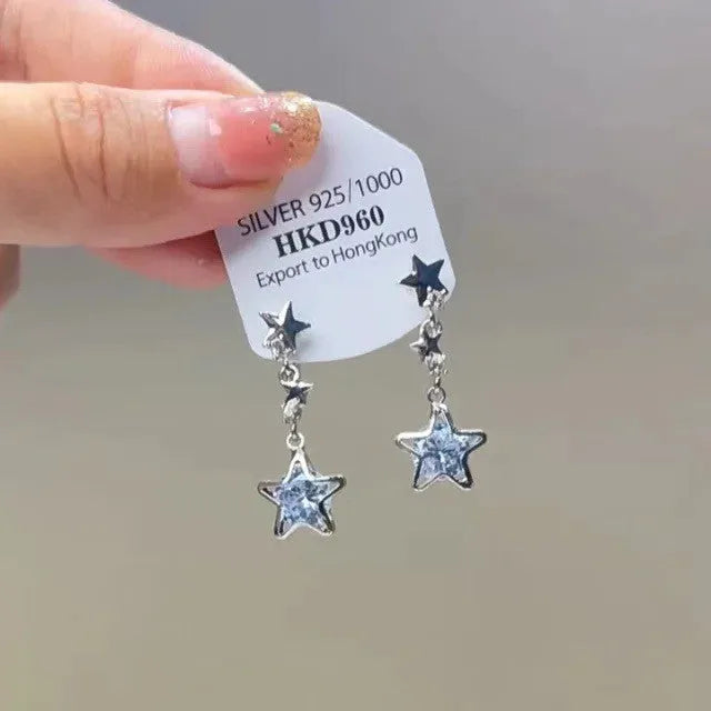 Geometric heart-shaped women's ear clips with rhinestone, star and tassel decorations on alloy.