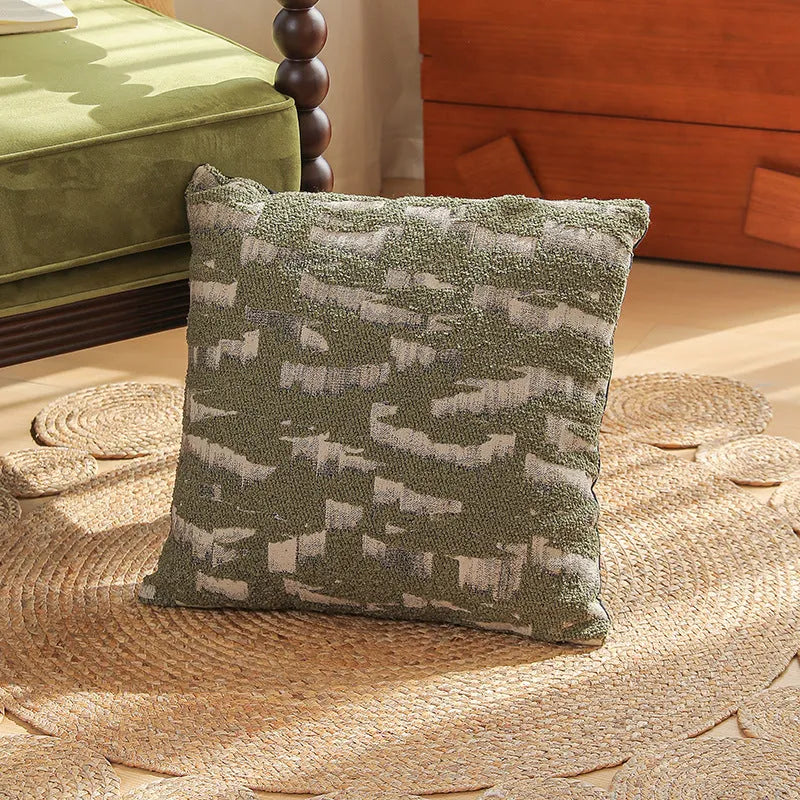 Close-up of a retro floral jacquard cushion cover in a choice of colours, showing texture and zip detail.