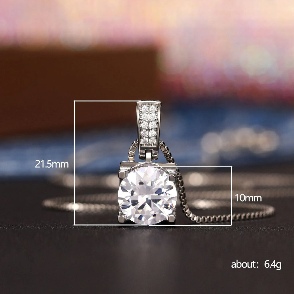 Copper clavicle chain with artificial diamond round pendant in XL484 white gold finish on female model