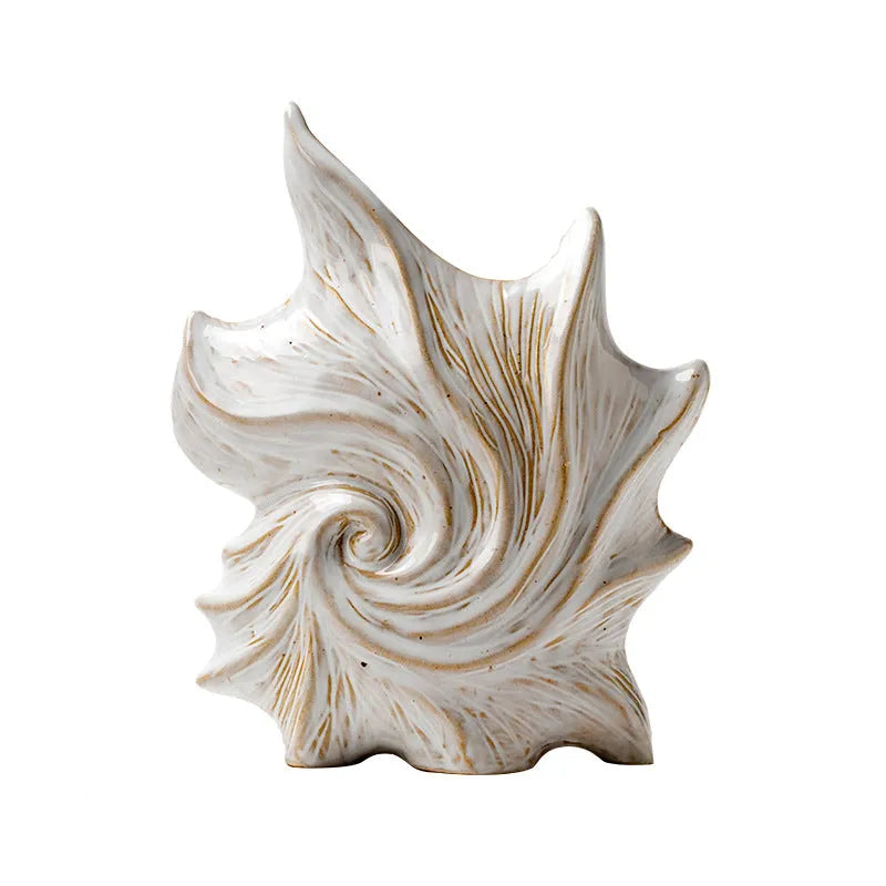 French art ceramic vase with coloured glaze in European retro style on wooden table