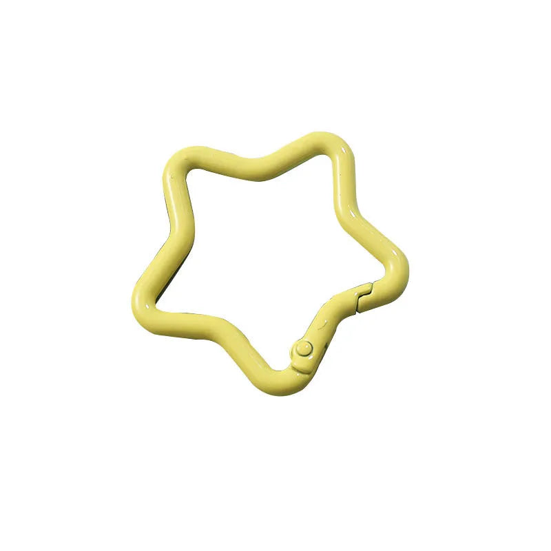 Zinc alloy five-pointed star keychain in multiple macaron colours including pink, blue, and purple