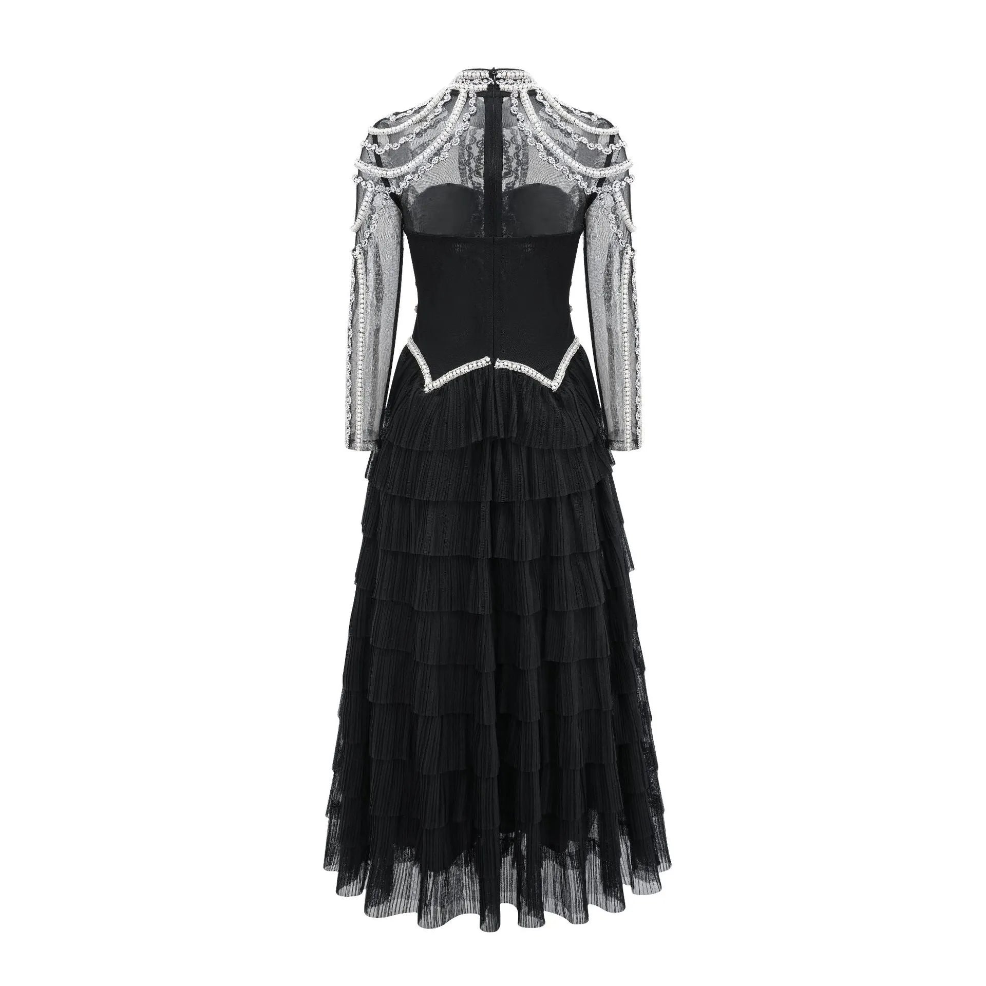 Women's long sleeve black dress with beaded decoration and a full-length skirt.