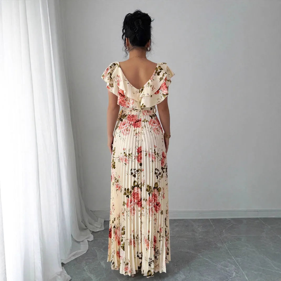 Apricot floral print V-neck dress with ruffled sleeves and a voluminous high-waisted swing skirt.