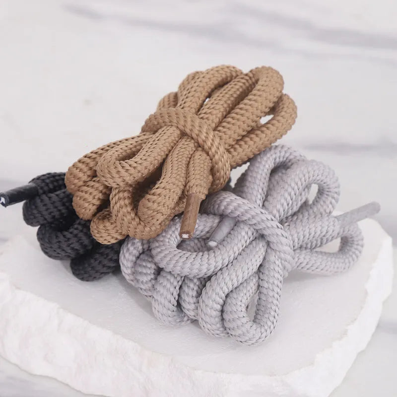 Set of oval 1.0mm wide replacement shoelaces in multiple colours including black, pink, red, and blue, shown in various lengths.