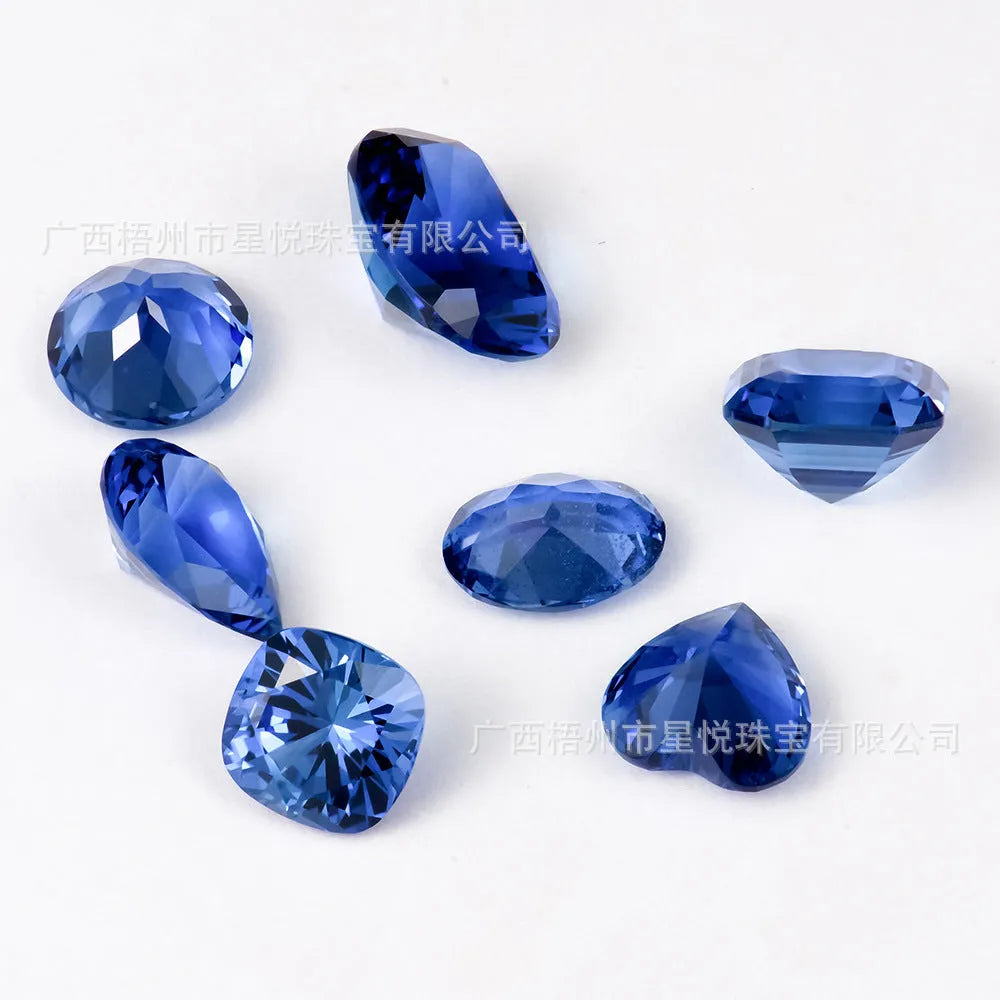 Royal blue cultivated gems with love shaped tiara cut in multiple shapes and carat weights