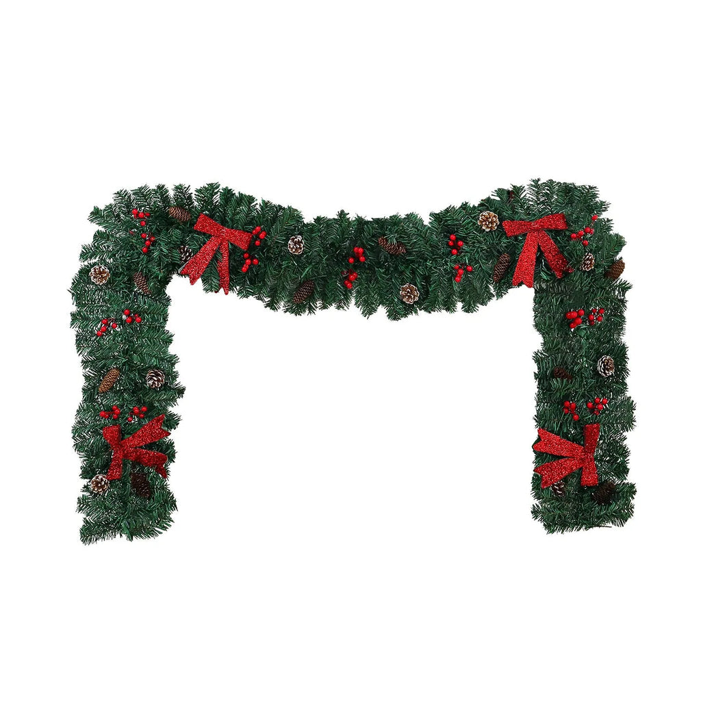 European-style rattan Christmas cane decoration with pine cone and red bow, approximately one metre tall.