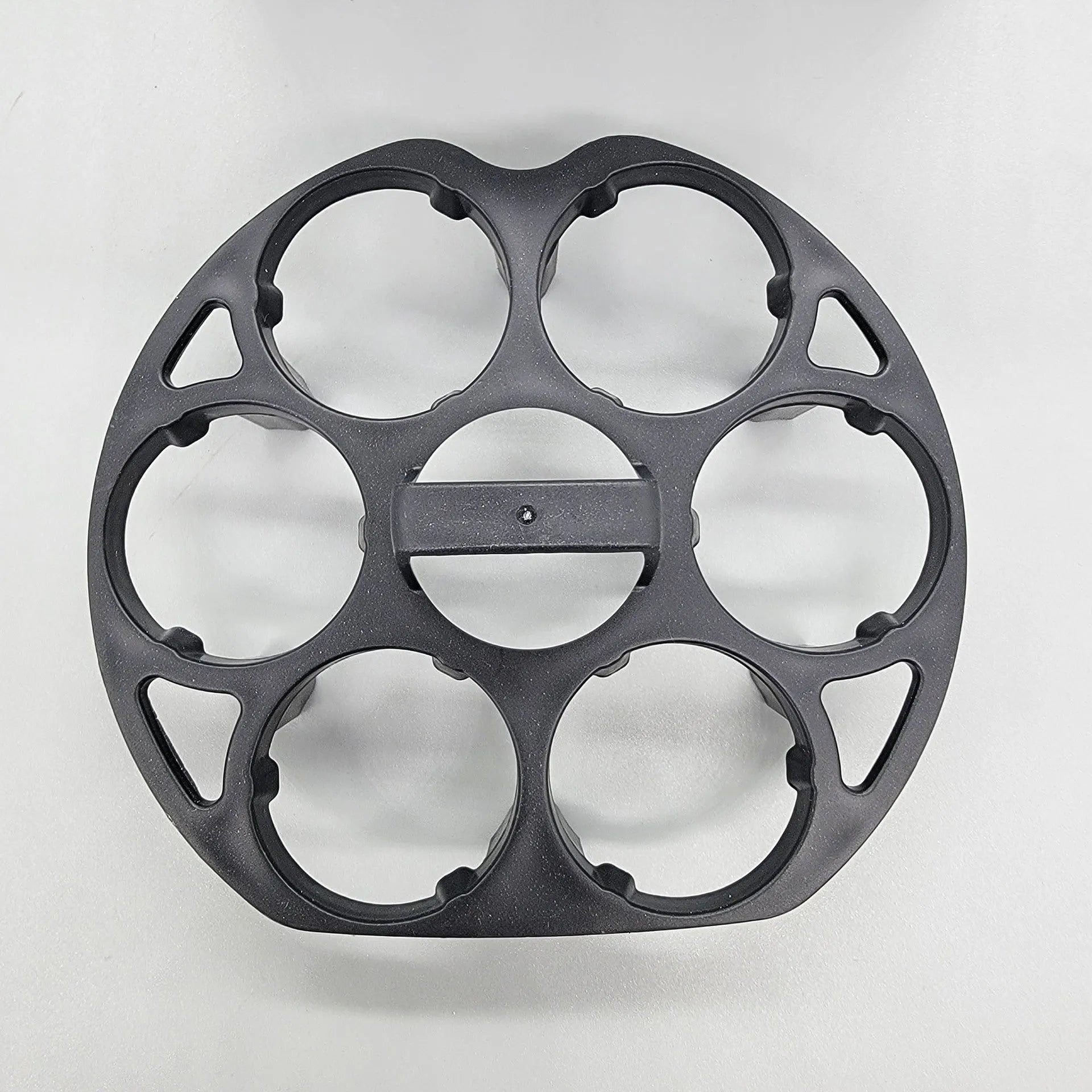 A black plastic egg holder rack for kitchen cooking machine storage, shown with dimensions.