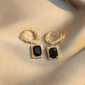 Copper earrings with geometric quadrilateral shape and black zircon stones in French Court retro style