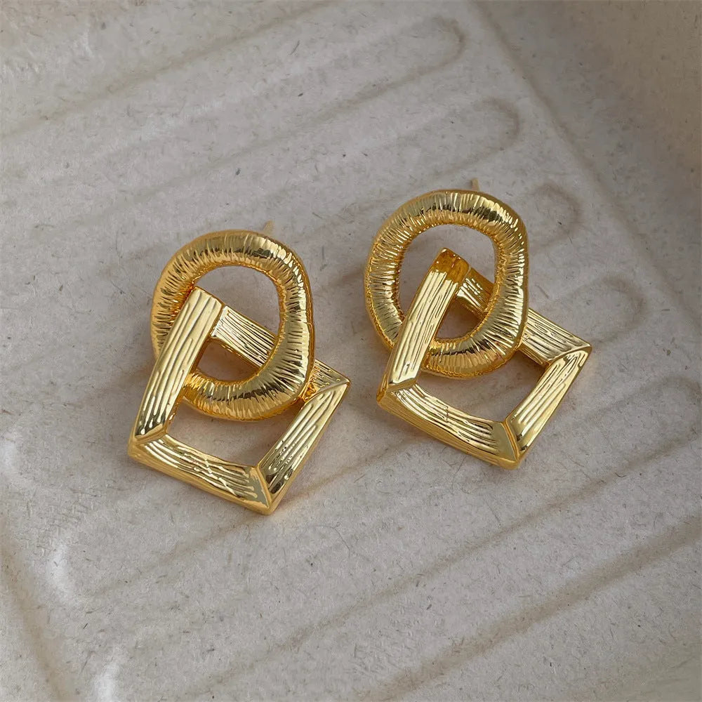Retro geometric circle pendant earrings with 3.4cm drop in gold or silver electroplated finish