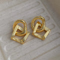 Retro geometric circle pendant earrings with 3.4cm drop in gold or silver electroplated finish