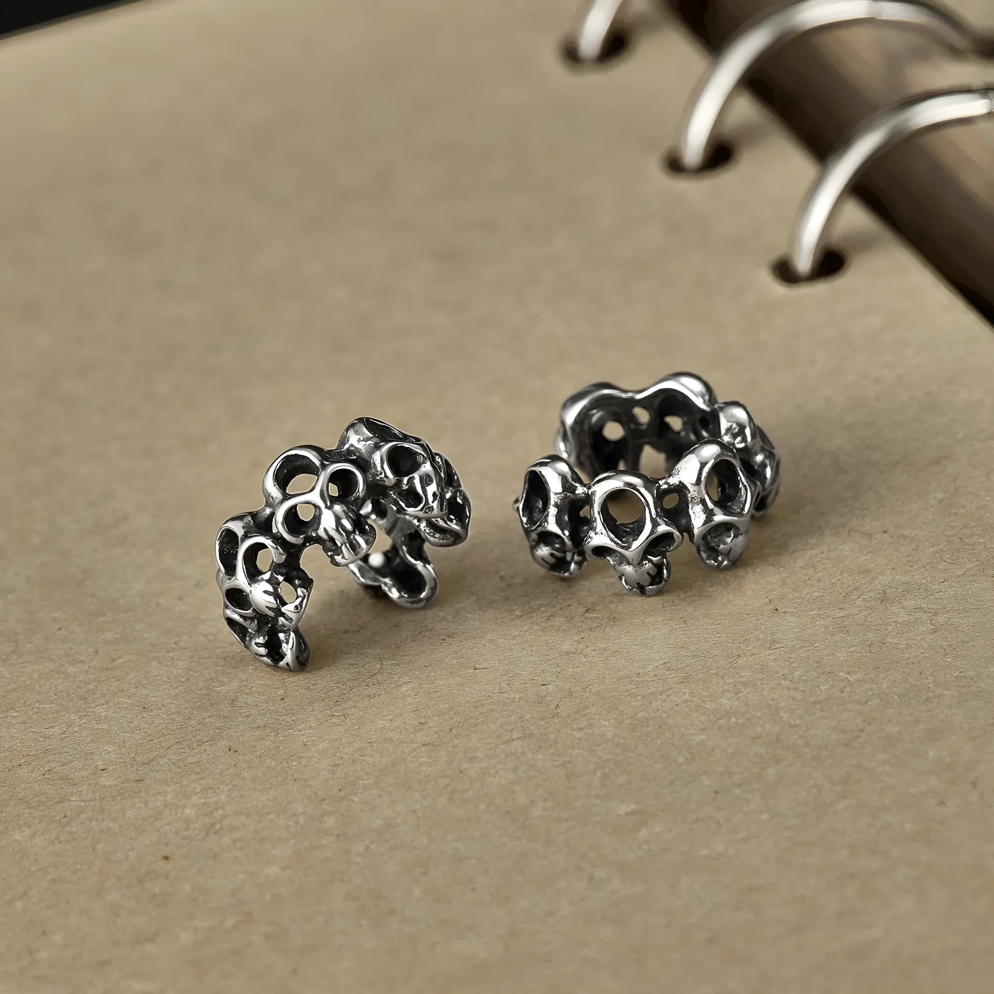 Retro hollow skull ear clip earrings with stainless steel construction and geometric hip hop style design