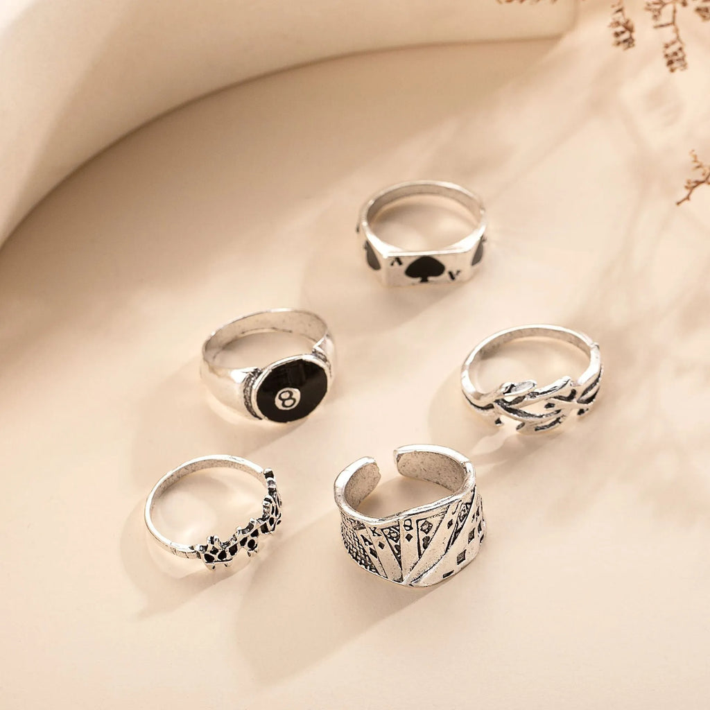 Black alloy poker ring with retro spade card design for women