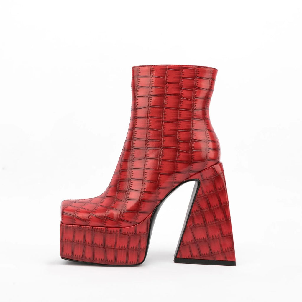 Women's ankle boot with a super high heel in a solid beige colour, made from artificial PU material.
