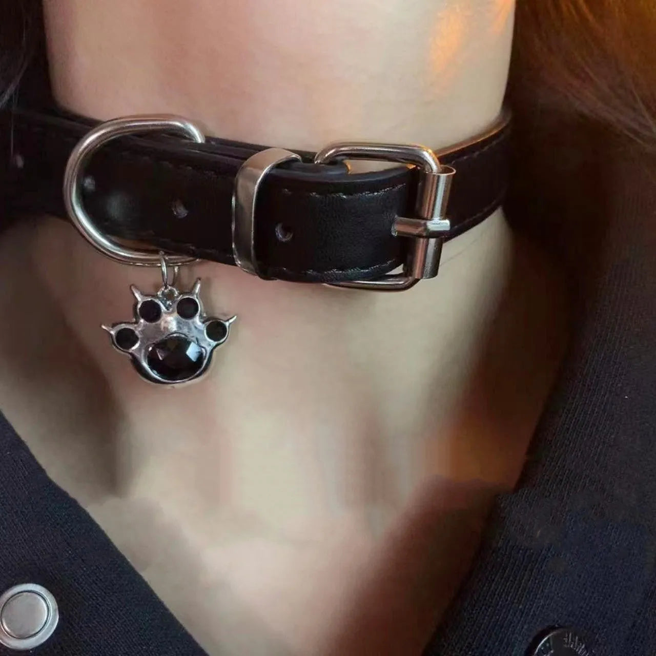 Black leather dog collar with bell pendant showing three design options adjustable from 21cm to 50cm