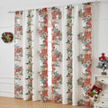 Rectangular printed Christmas curtain with semi-sunshade fabric on a window.