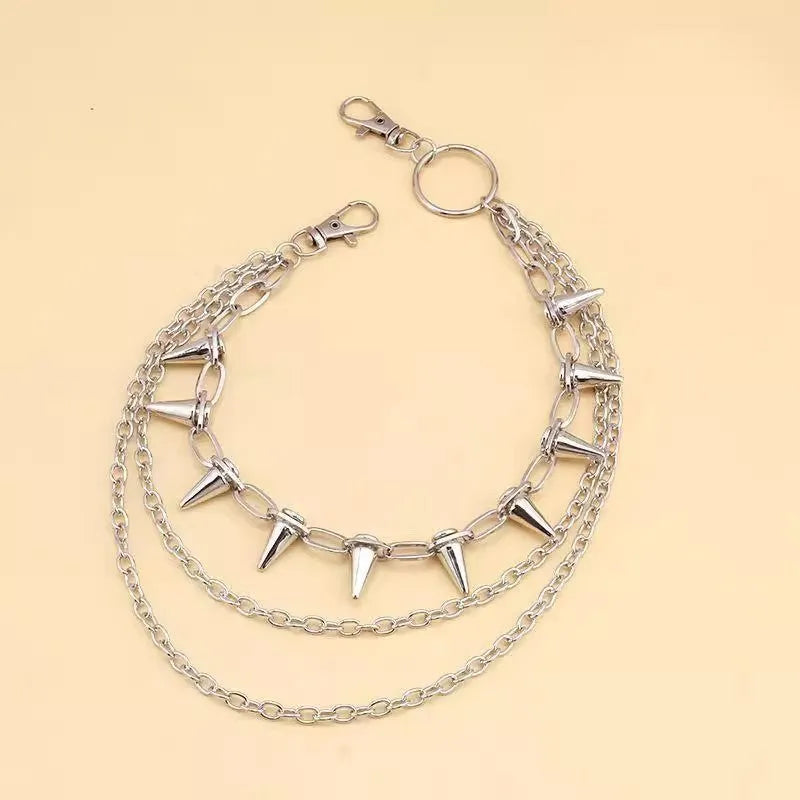 Silver metal waist chain with punk rivets and zipper decoration measuring 115cm length