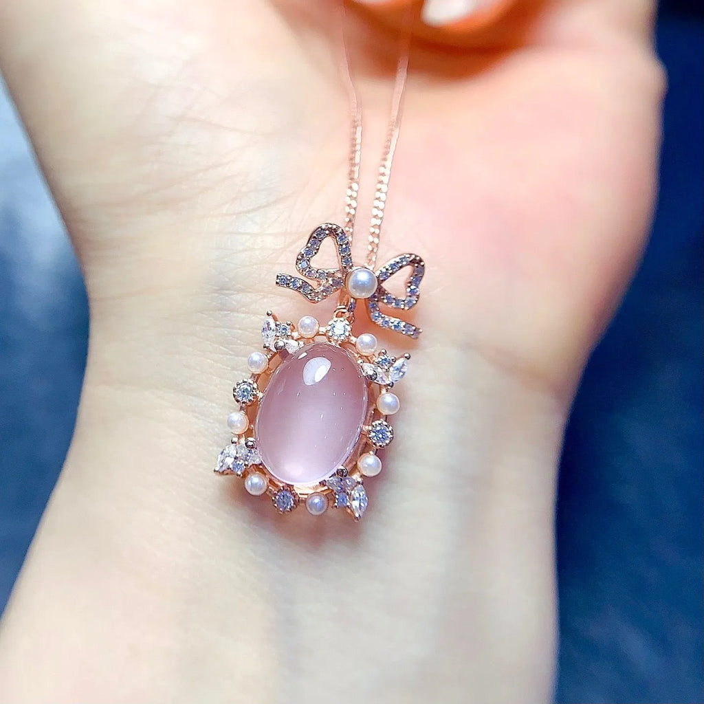 Geometric rose quartz pendant necklace with silver chain and rose gold plating