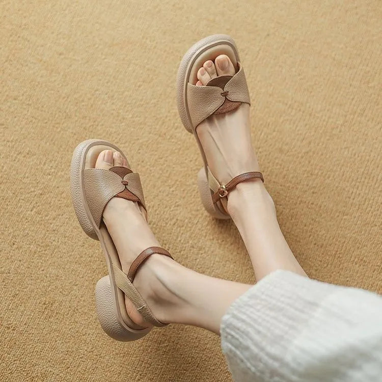 Women's khaki open toe sandals with a chunky platform heel made from renewable leather.