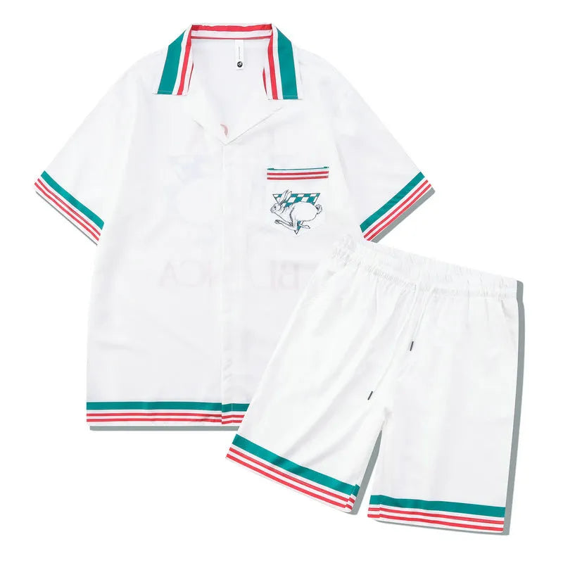 Men's plaid print beach shirt and shorts outfit set on a mannequin showing coordinated summer wear