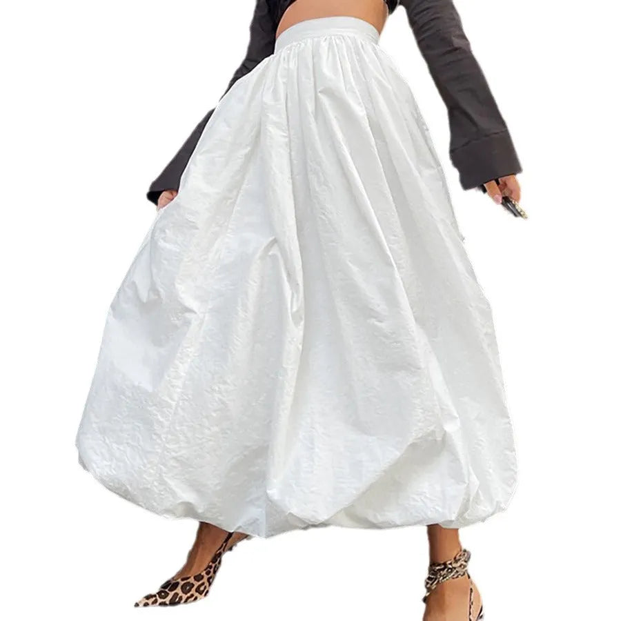 Women's cotton long skirt in black solid colour with knee-length design