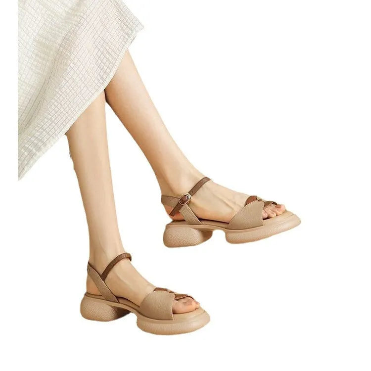 Women's khaki open toe sandals with a chunky platform heel made from renewable leather.