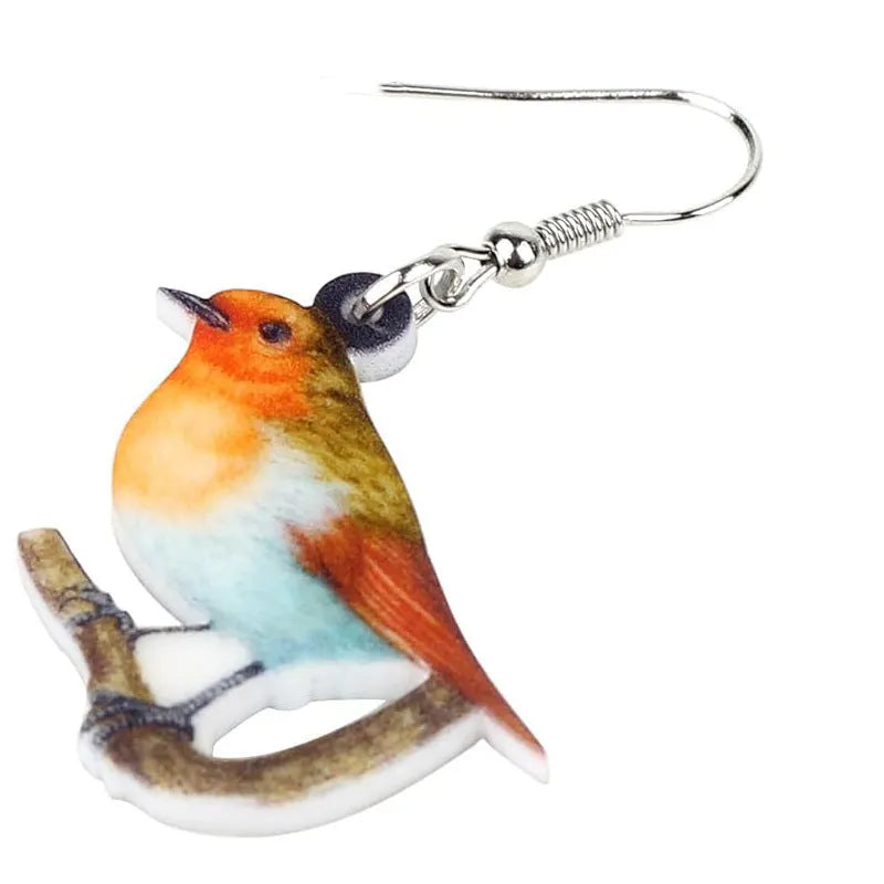 Acrylic blue titmouse pendant earrings with geometric animal zodiac design and printed snake pattern