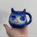 Resin cat cup gift with crystal Earth globe in blue, green, pink, or purple colour options.