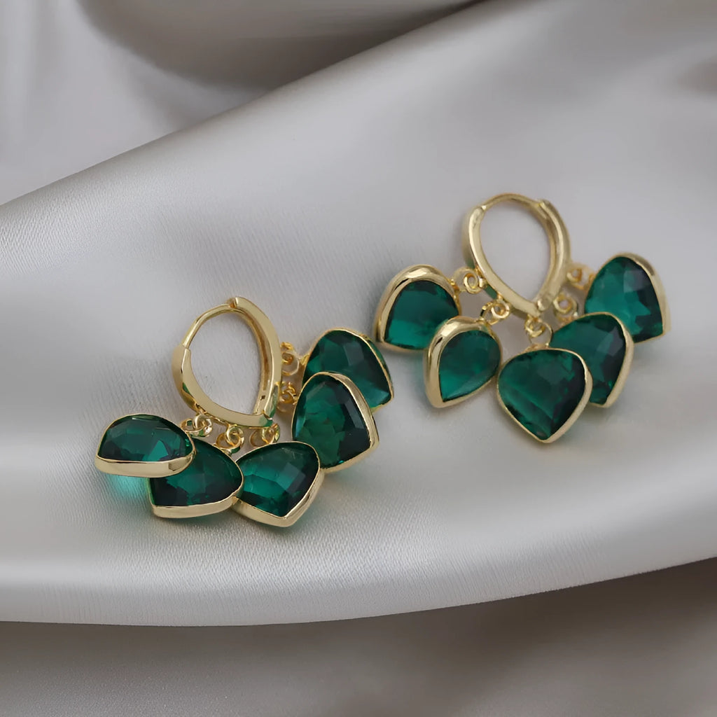Green heart-shaped glass pendant ear clip earrings with alloy inlay in Korean style for women.