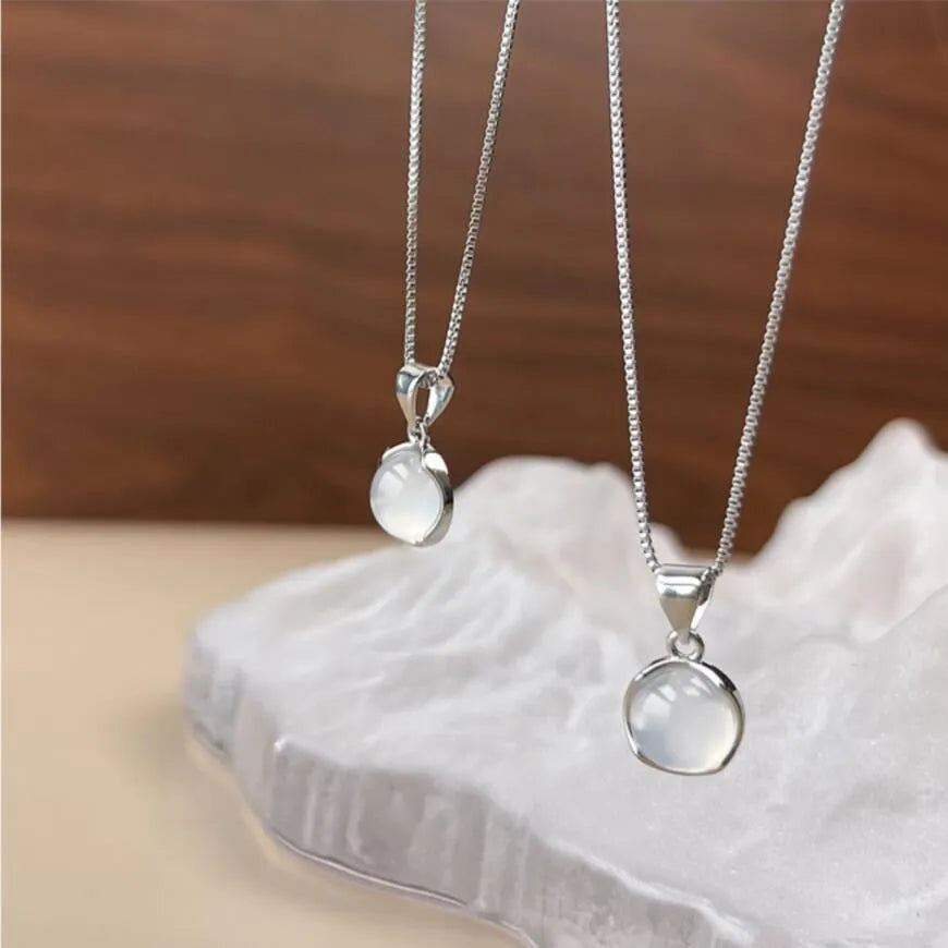 Women's oval pendant necklace with geometric eight awn star design on adjustable 21-50cm chain in X7 6moon light colour