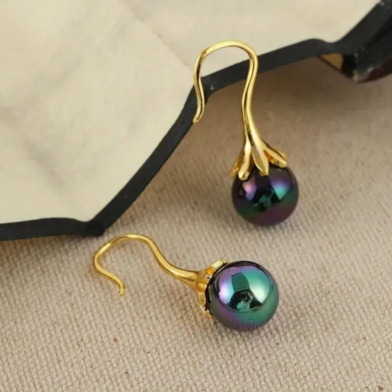 Women's retro fashion earrings with electroplated gold finish and alloy construction