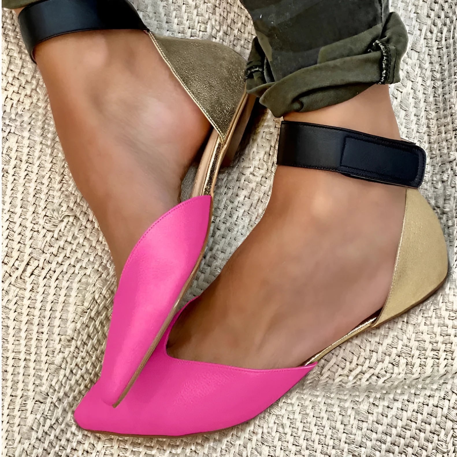 Women's velcro hollowed sandals in rose red colour showing adjustable straps and flat heel design