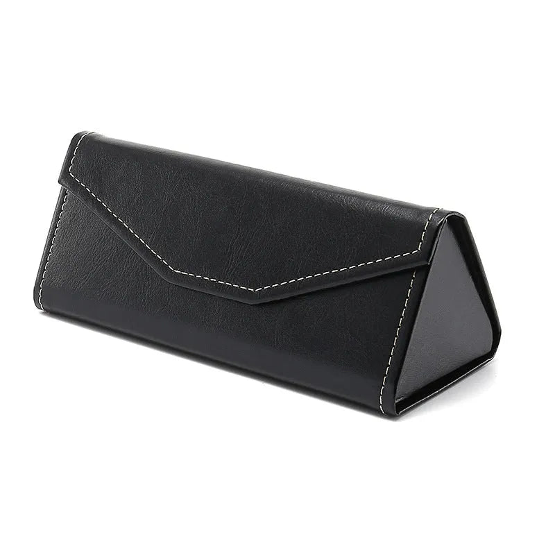 Handmade triangular folding glasses case in a PU cowhide pattern, shown closed and open next to a pair of full-rim frame glasses.