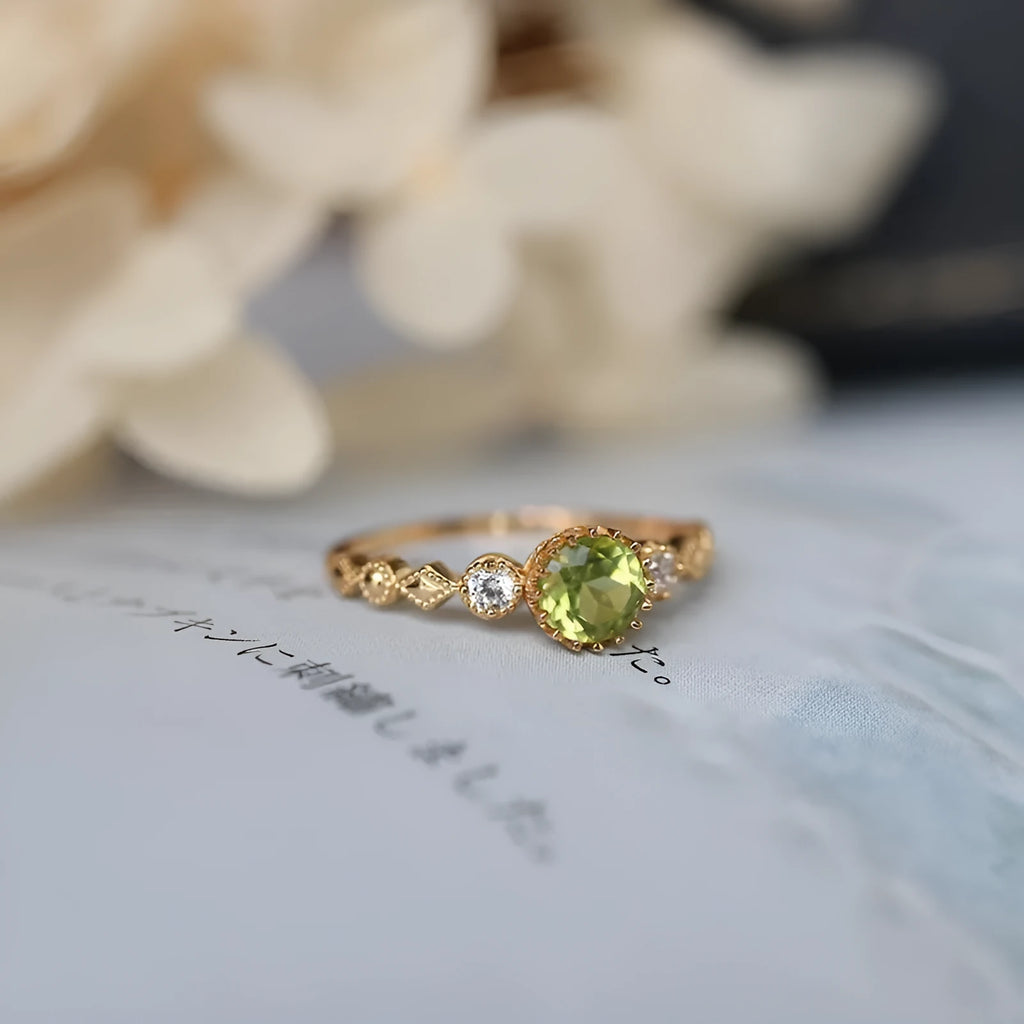 Geometric copper art ring with green imitation peridot finish in retro Japanese style.