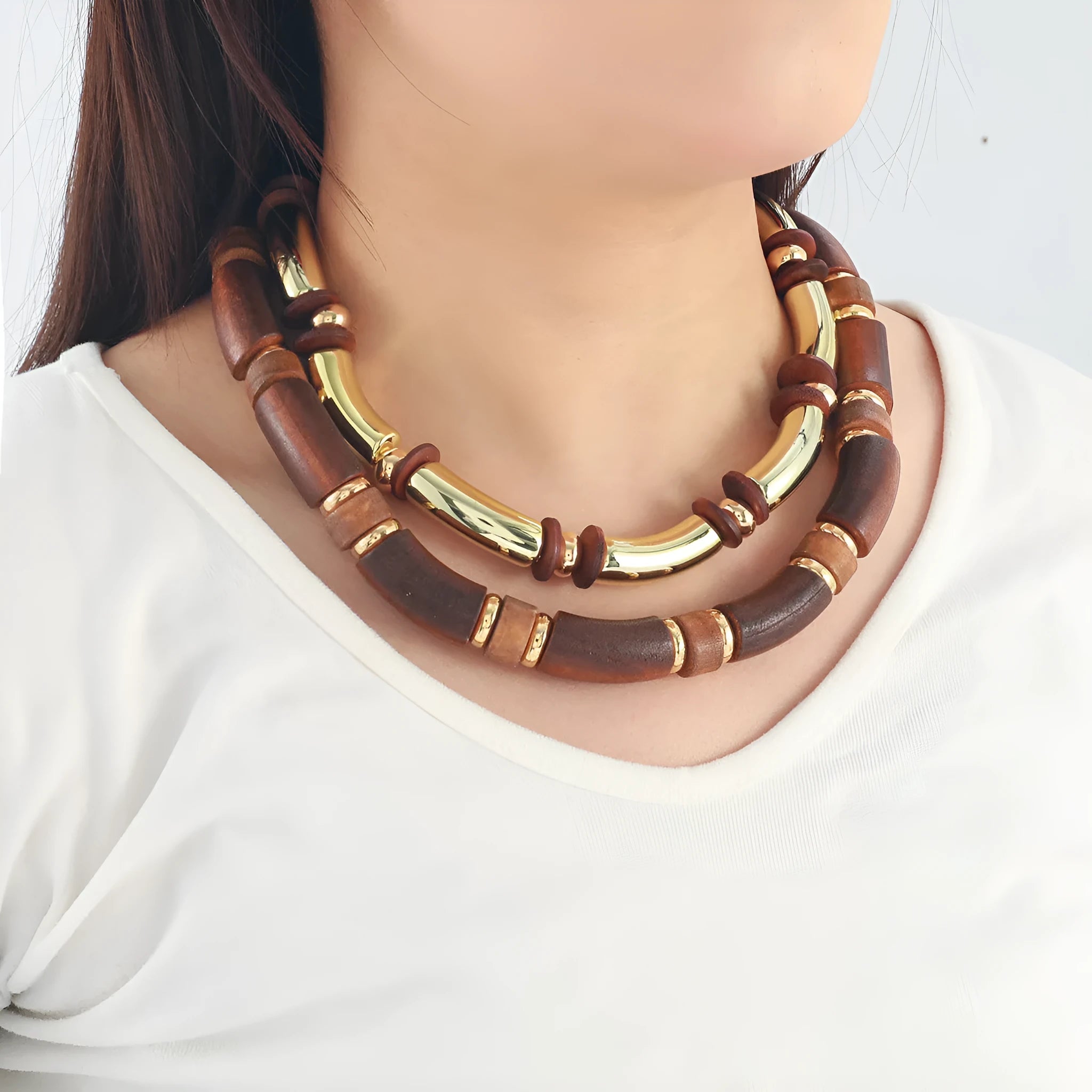 Alloy multi-layer necklace and bracelet set for women in silver tone with round details.