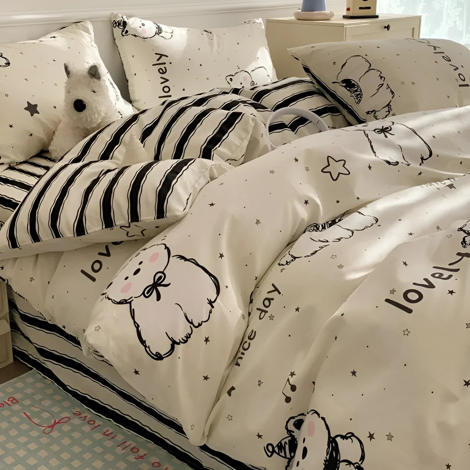 Cartoon dog pattern pure cotton four-piece bedding set shown on bed with multiple size options