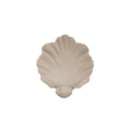 White resin shell-shaped fruit plate ornament with light luxury styling on a table.