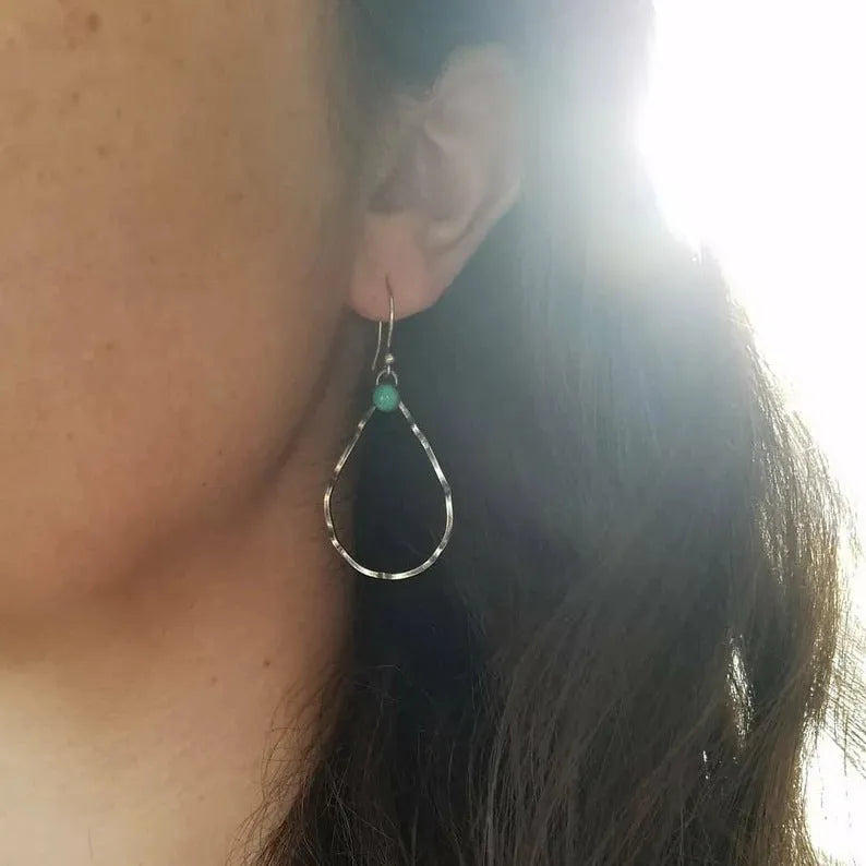 Turquoise circle bohemian earrings with antique silver finish and geometric design